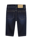 Jeans blu cinque tasche con patch logo Boss