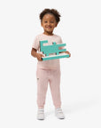 Pantalone in felpa rosa con patch logo Lacoste