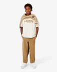Maglione beige ad intarsio con patch logo Lacoste