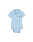 Body azzurro con patch logo Lacoste