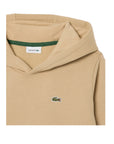 Felpa con il cappuccio beige e patch logo Lacoste