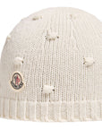 Cappello bianco con dettagli pois e patch logo Moncler