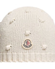 Cappello bianco con dettagli pois e patch logo Moncler