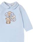 Tutina in ciniglia azzurro con patch orsetto con palloncini e logo Nanan frontale