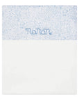Coperta bianca in tessuto Liberty color azzurro