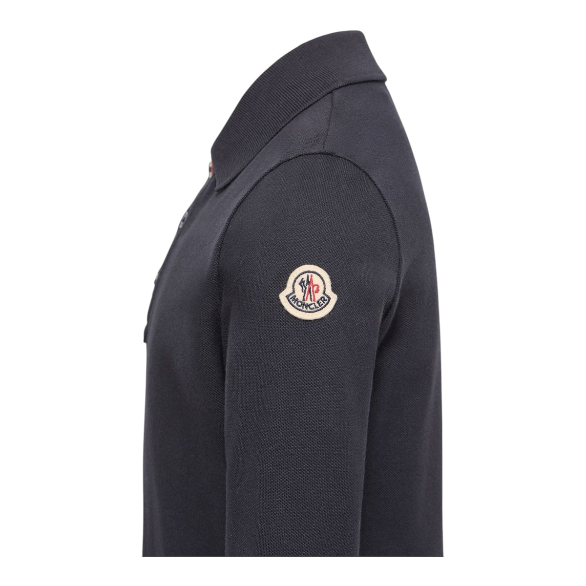 Polo blu con patch logo Moncler sulla manica