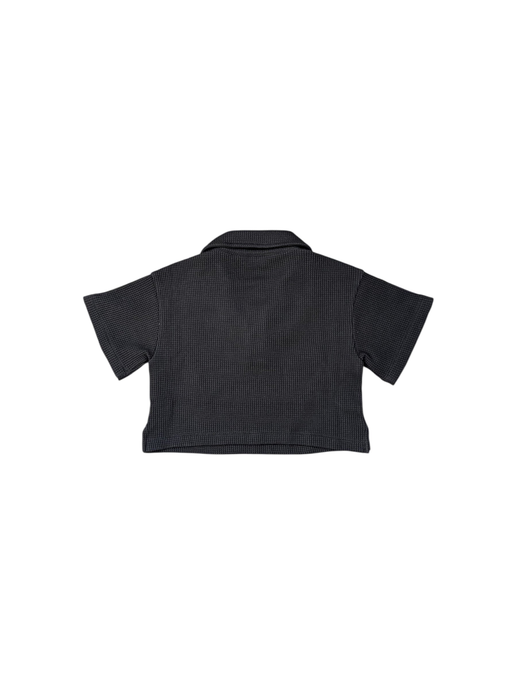 Polo cropped nera con stampa logo Palm Angels