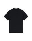 Polo nera con dettaglio gommato logo Moncler