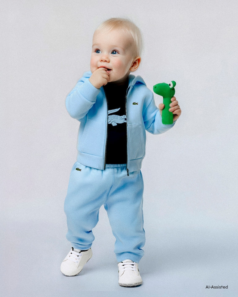 Completo tre pezzi azzurro con dettagli logo Lacoste