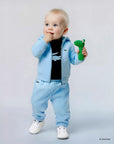 Completo tre pezzi azzurro con dettagli logo Lacoste