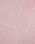 Coperta rosa con dettagli pois e logo Paz Rodriguez