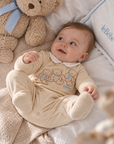 Tutina in ciniglia beige con orsetti e logo Le Bebé cuciti frontale