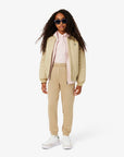 Pantalone in felpa beige con patch logo Lacoste