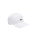 Cappello bianco con visiera e logo Lacoste cucito