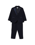 Smoking blu con spilla logo Manuel Ritz