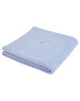 Coperta azzurra con dettagli logo Paz Rodriguez frontali