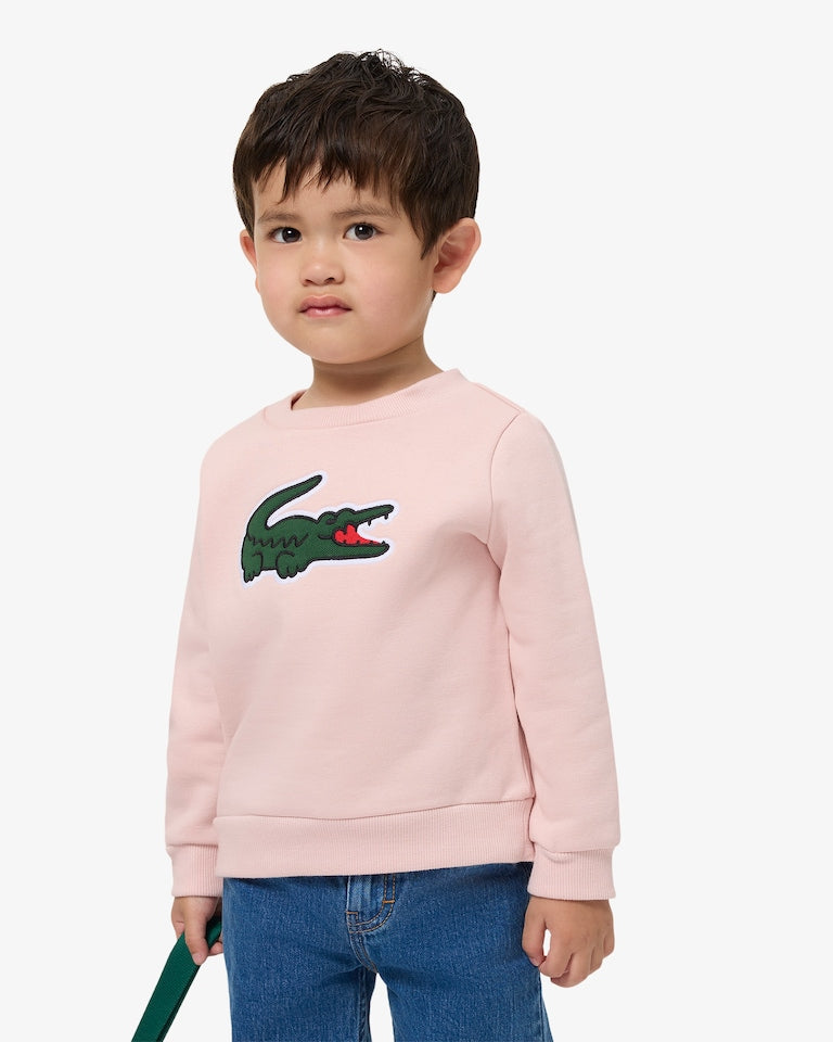 Felpa rosa con patch Lacoste cucito frontale
