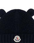 Cappello blu con orecchie e patch cucito Moncler