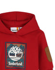 Felpa rossa con cappuccio baby e stampa logo Timberland frontale