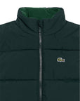 Smanicato verde con patch logo Lacoste cucito frontale