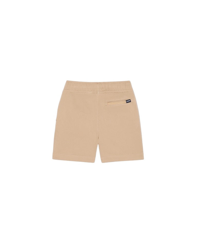 Pantaloncino beige con patch logo Lacoste