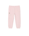 Pantalone in felpa rosa con patch logo Lacoste