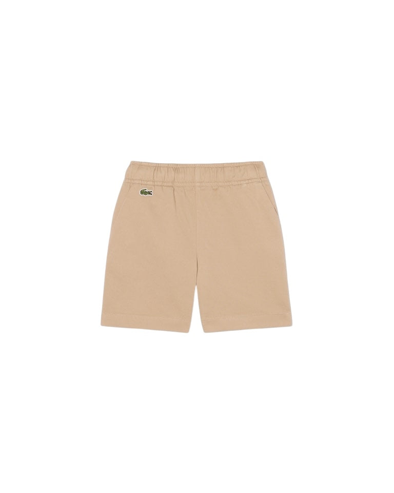 Pantaloncino beige con patch logo Lacoste