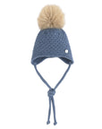 Cappello azzurro con laccetti e pompon Paz Rodriguez