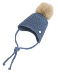 Cappello azzurro con laccetti e pompon Paz Rodriguez
