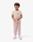 Pantalone in felpa rosa con patch logo Lacoste