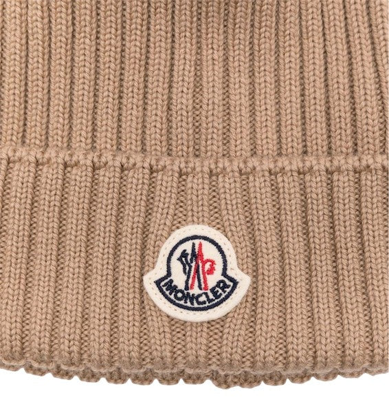 Cappello beige con pompom Moncler