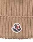 Cappello beige con pompom Moncler