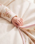 Tutina bianca con stampa orsi e dettagli logo Le Bebé rosa