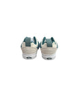 Scarpe panna con dettagli verdi a contrasto Vans